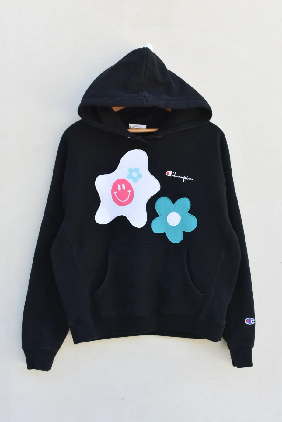 MEZOTER “Happy Bloom” Hoodie – Black Champion Hoodie with Smiley & Flower Patches