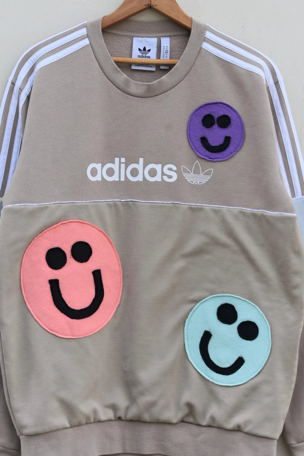 MEZOTER “Smiley Pop” Sweatshirt – Beige Adidas Sweatshirt with Multicolor Smiley Patches
