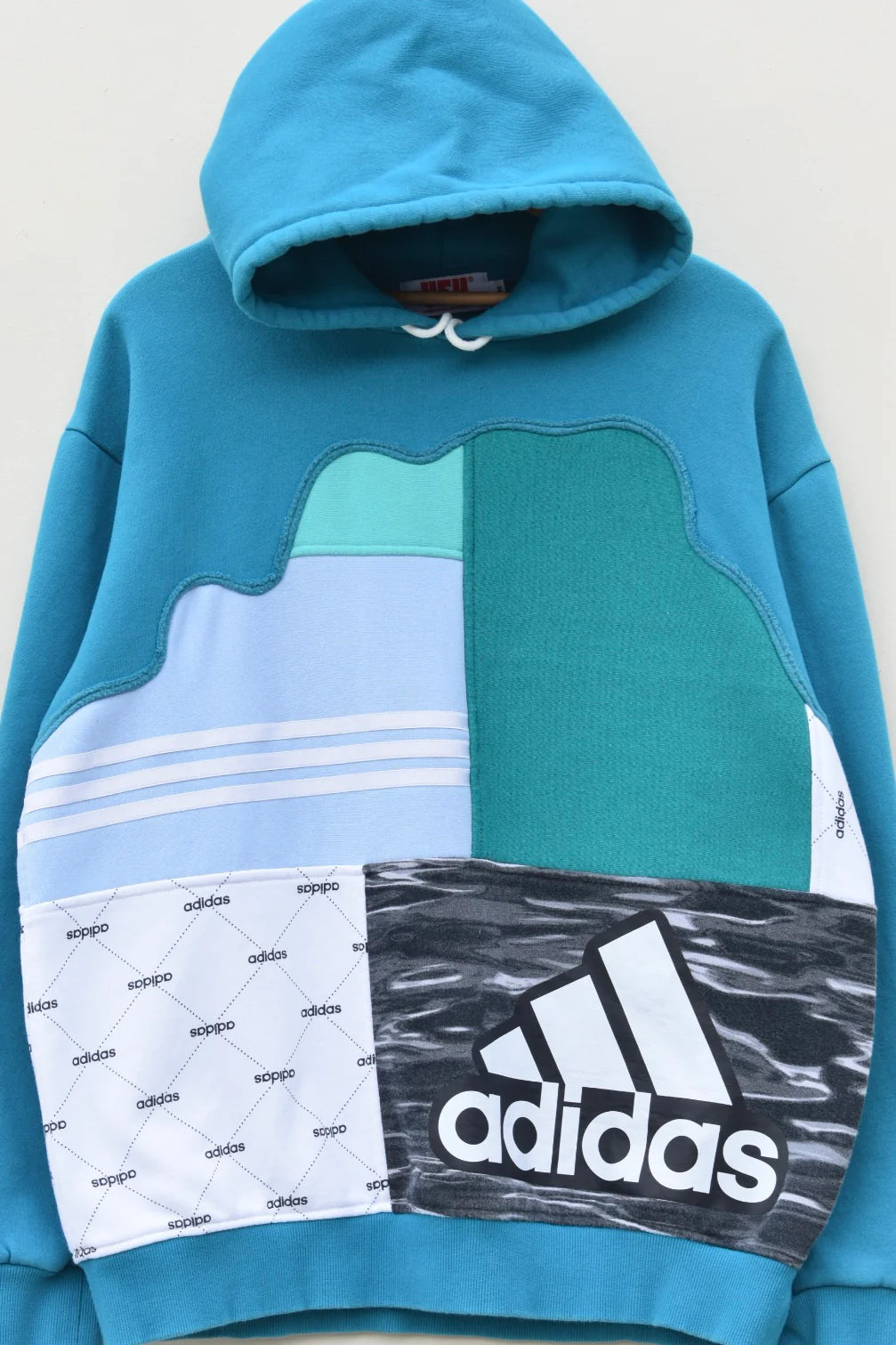 MEZOTER “Aero Patch” Hoodie – Teal Blue Artistic Patchwork Oversized Streetwear